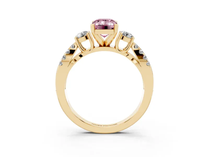 Fancy Pink Emerald Cut Diamond Three-Stone Ring Set in Yellow gold with Pavé Split Shank and Prong Setting