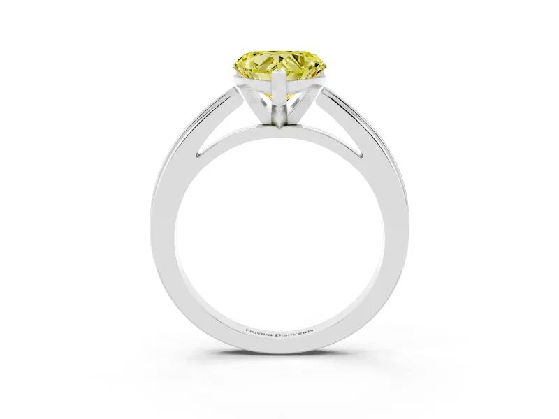 Fancy Yellow Heart Cut Diamond Solitaire Ring Set in Platinum with Prong Setting and Classic Band