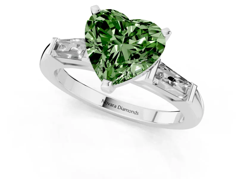 Fancy Green Heart Cut Diamond Solitaire Ring Set in Silver with Tapered Baguette Side Stones and Prong Setting