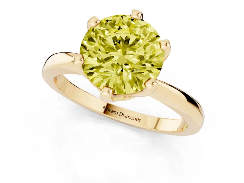 Fancy Yellow Round Cut Diamond Solitaire Engagement Ring Set in Yellow gold with Slim Tapered Solitaire Band