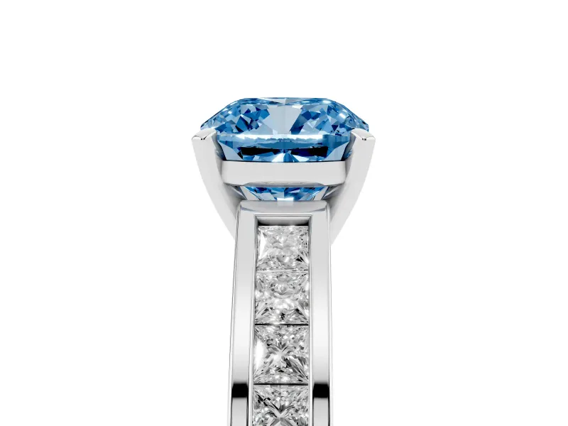 Fancy Blue Cushion Cut Diamond Solitaire Ring Set in White gold with Channel-Set Band and Prong Setting