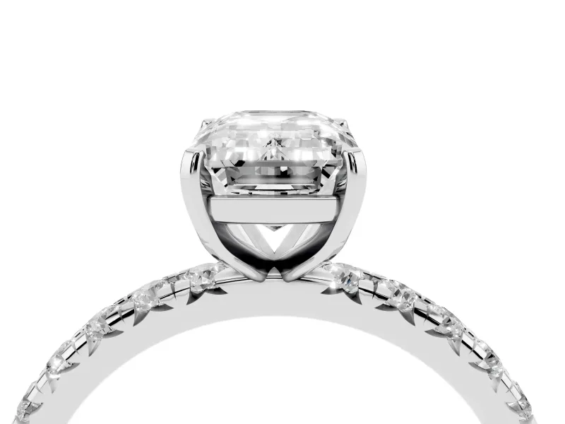Emerald Cut Diamond Pavé Solitaire Ring Set in White gold with Round Band and Prong Setting