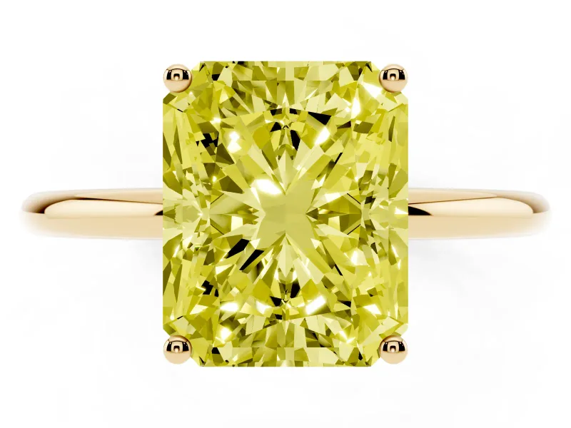 Fancy Yellow Radiant Cut Diamond Solitaire Engagement Ring Set in Yellow gold with Thin Band and Prong Setting