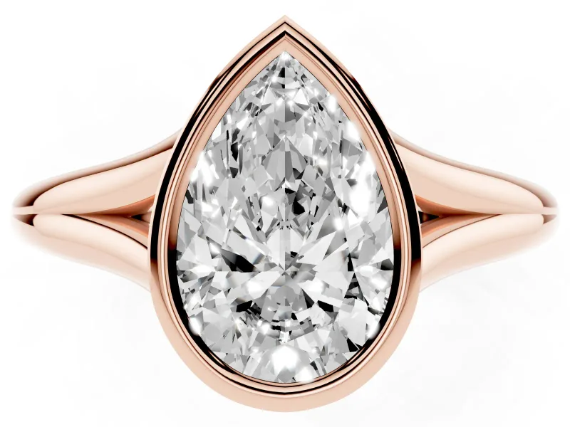 Bezel Set Pear Cut Diamond Solitaire Ring Set in Rose gold with Tapered Band