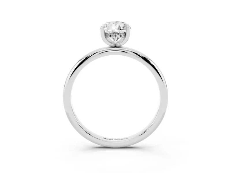 Pear Cut Diamond Solitaire Engagement Ring Set in Platinum with Prong Setting and Polished Band