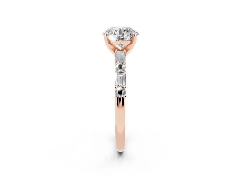 Round Cut Diamond Solitaire Set in Rose gold with Side Baguettes and Channel Set Band