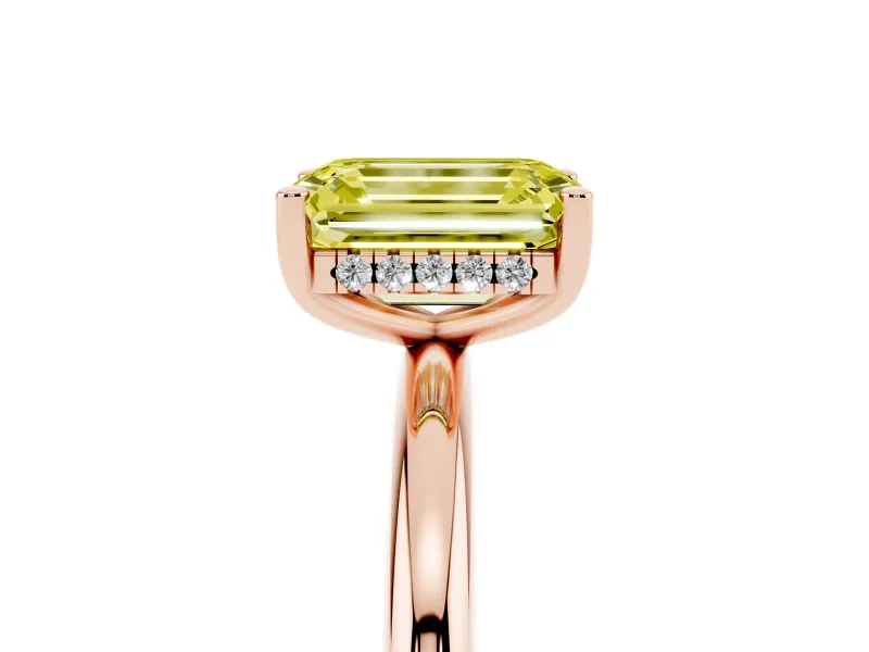 Fancy Yellow Emerald Cut Diamond Solitaire Engagement Ring Set in Rose gold with Prong Setting and Polished Band