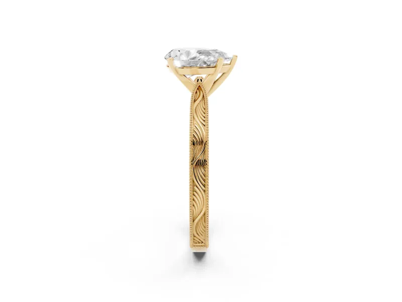 Pear Cut Diamond Solitaire Milgrain Engraved Band Set in Yellow gold with Prong Setting