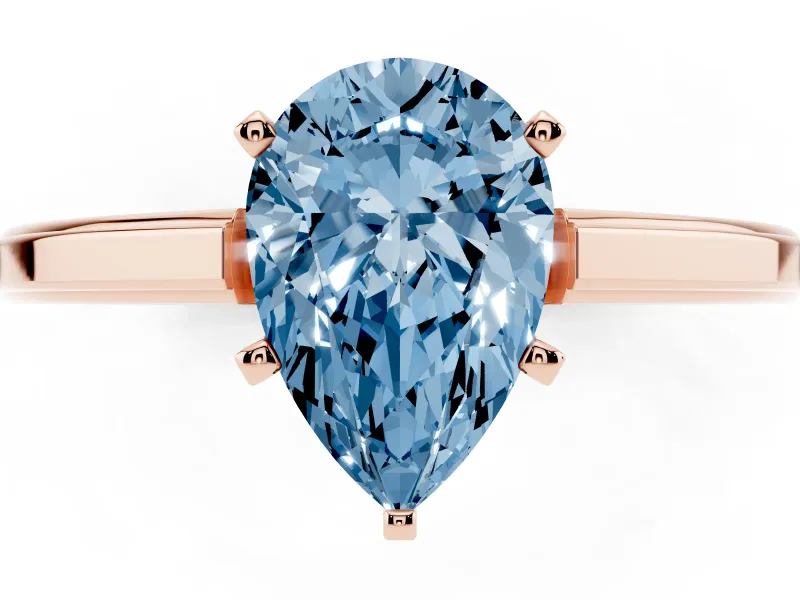 Fancy Blue Pear Cut Diamond Solitaire Ring Set in Rose gold with Prong Setting and Classic Band