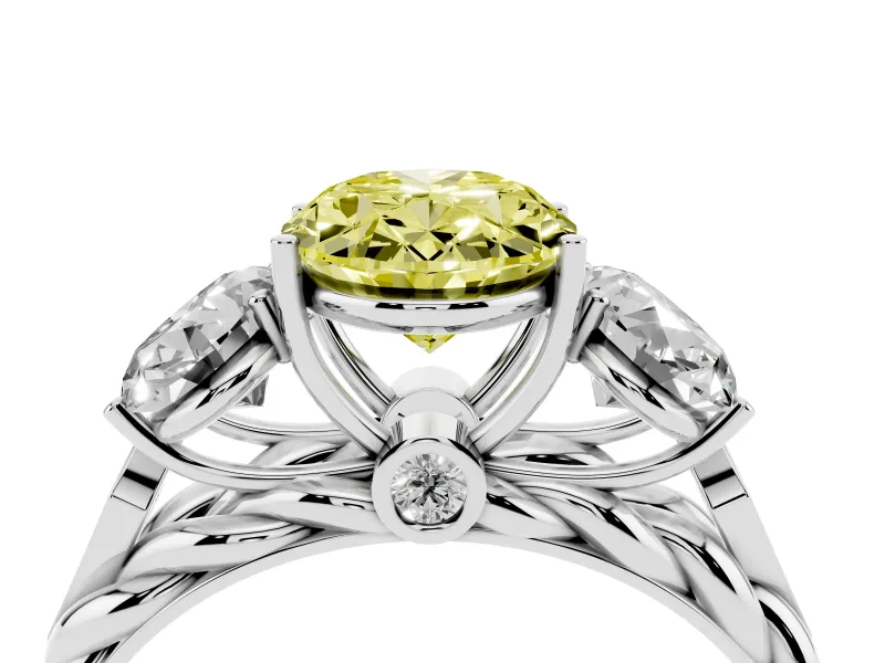 Fancy Yellow Oval Cut Diamond Three-Stone Ring Set in Platinum with Braided Band