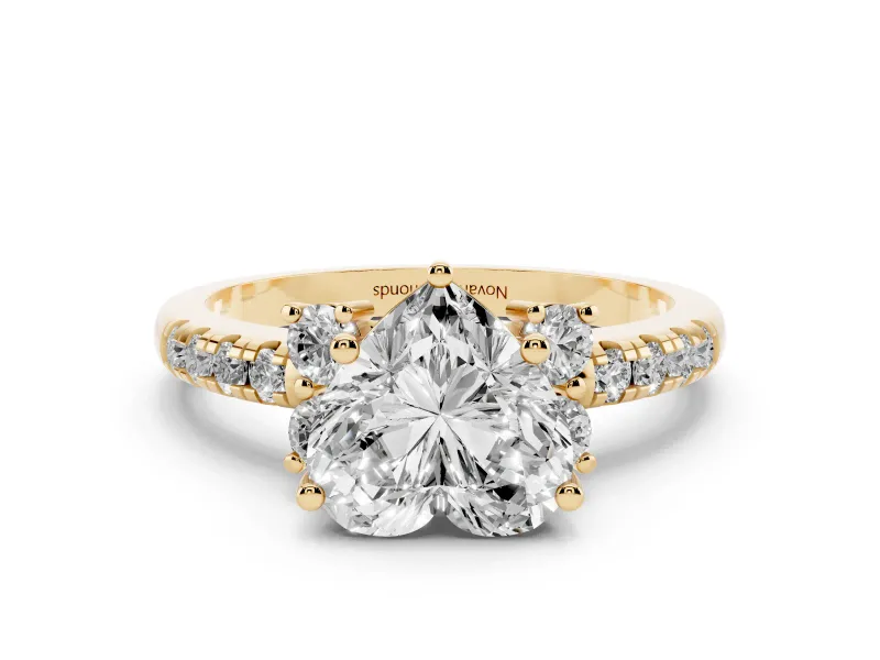 Heart Cut Diamond Three-Stone Pavé Ring Set in Yellow gold with Prong Setting