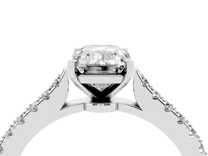 Emerald Cut Diamond Solitaire Engagement Ring Set in Silver with Delicate Pavé Band and Prong Setting