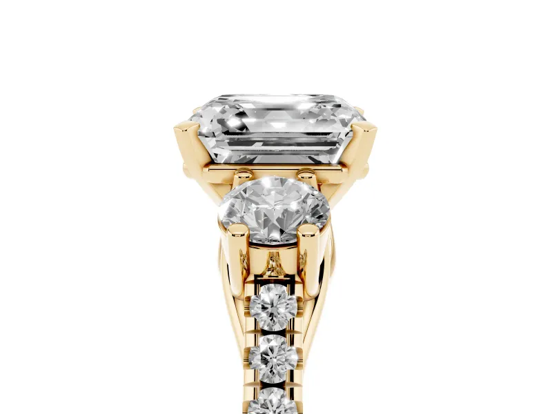 Three-Stone Asscher Cut Diamond Pavé Band Ring Set in Yellow gold with Prong-Set Trio
