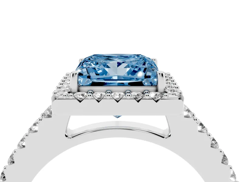 Fancy Blue Princess Cut Diamond Halo Pavé Solitaire Ring Set in White gold with Prong-Set Center Stone
