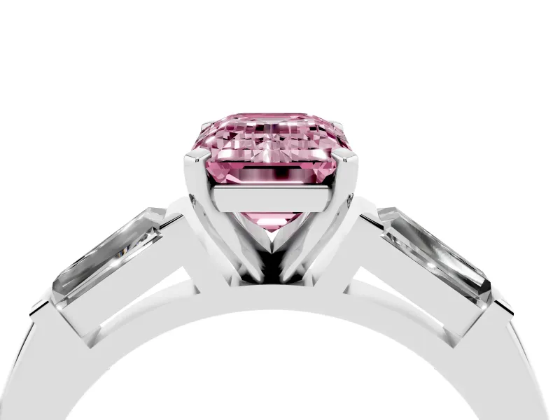 Fancy Pink Emerald Cut Diamond Solitaire Ring Set in White gold with Tapered Baguette Side Stones and Prong Setting