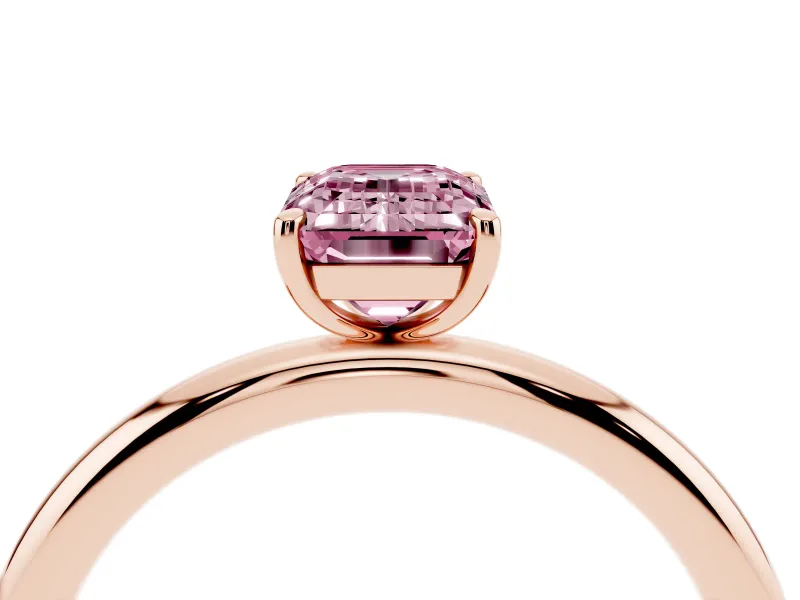 Fancy Pink Emerald Cut Diamond Solitaire Ring Set in Rose gold with Prong Setting on a Polished Plain Band