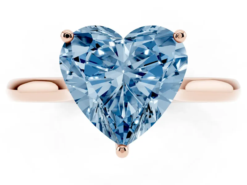 Fancy Blue Heart Cut Diamond Solitaire Ring Set in Rose gold with Cathedral Band and Prong Setting