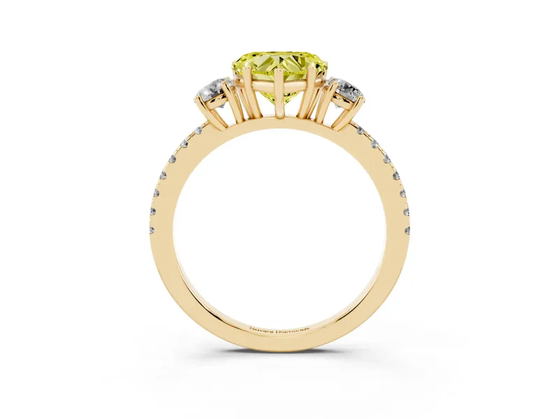 Fancy Yellow Heart Cut Diamond Three-Stone Ring Set in Yellow gold with Pavé Band and Graduated Sides