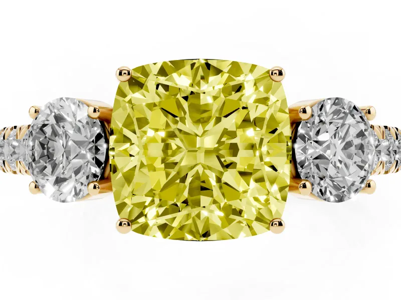 Fancy Yellow Cushion Cut Diamond Three-Stone Ring Set in Yellow gold with Round Side Stones and Delicate Pavé Band