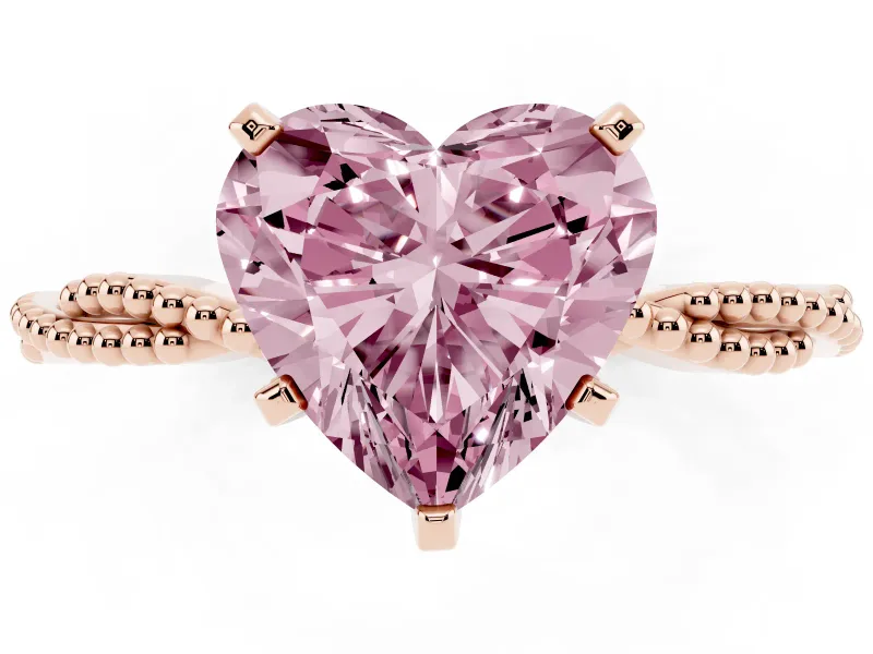 Fancy Pink Heart Cut Diamond Solitaire Ring Set in Rose gold with Twisted Band and Bead Prong Setting