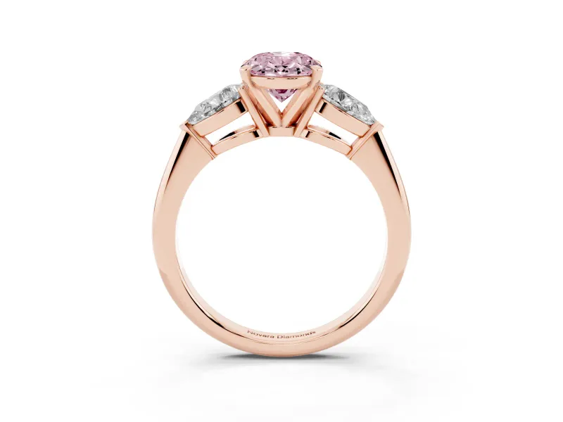 Fancy Pink Three-Stone Oval Cut Diamond Ring Set in Rose gold with Pear Side Stones and Prong Setting