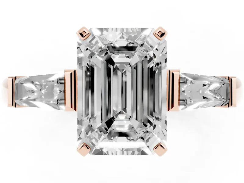 Emerald Cut Diamond Solitaire Ring Set in Rose gold with Tapered Baguette Side Stones and Prong Setting