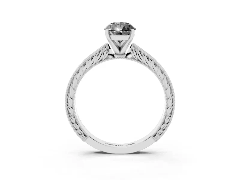 Fancy Black Pear Cut Diamond Solitaire Milgrain Engraved Band Set in White gold with Prong Setting