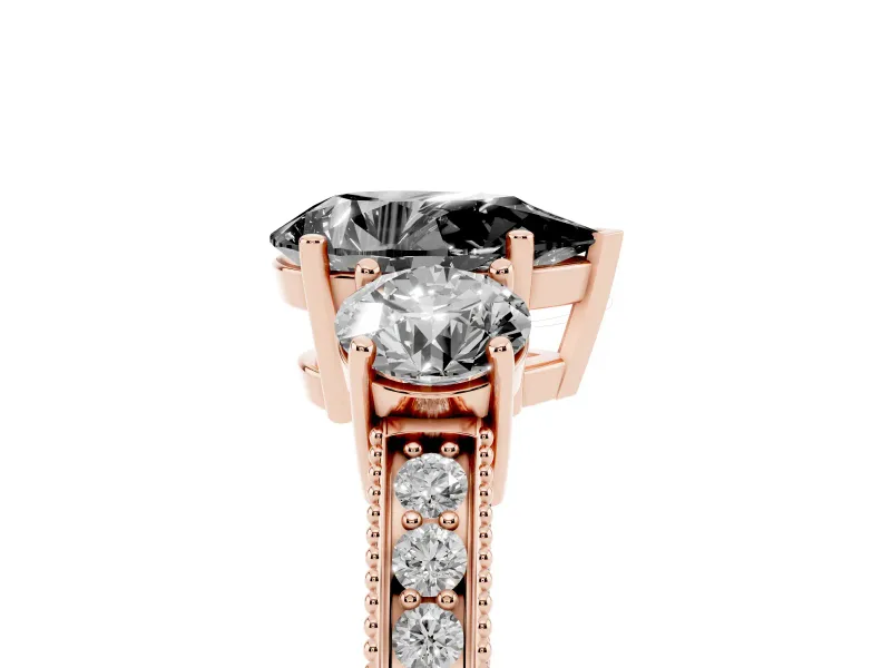 Pear-Shaped Three Stone Engagement Ring Setting for a Black Center | Graduated Pavé Band | Rose Gold