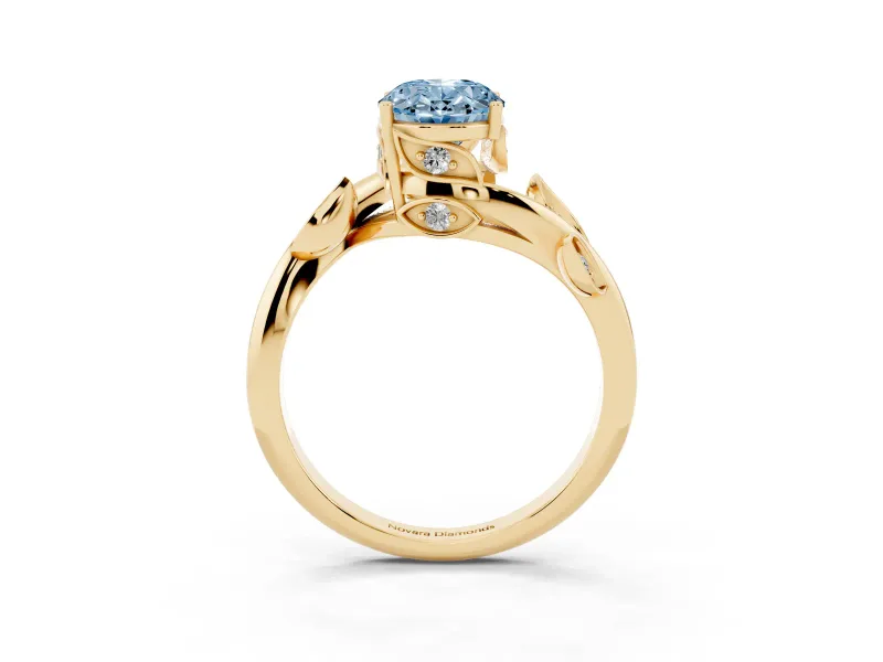 Fancy Blue Oval Cut Diamond Solitaire Twist Engagement Ring Set in Yellow gold with Pavé Leaf Accents