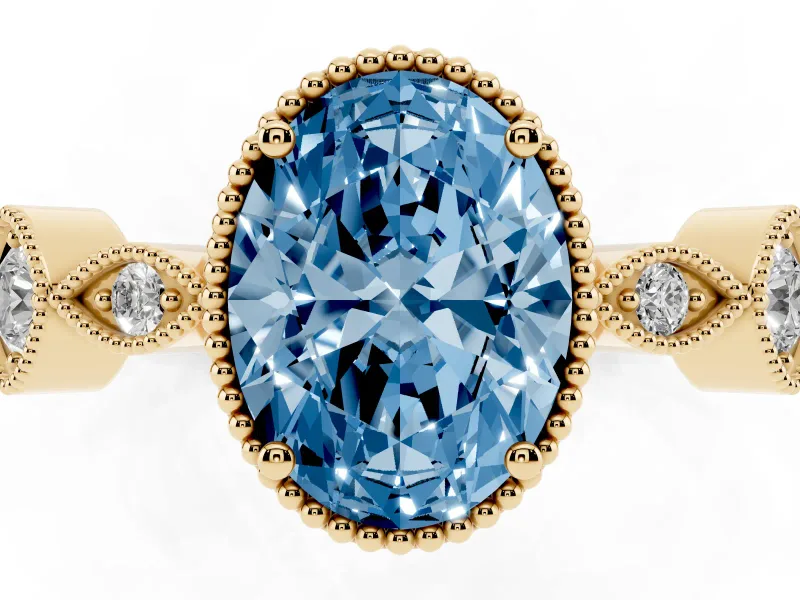 Fancy Blue Oval Cut Diamond Vintage-Inspired Milgrain Ring Set in Yellow gold with Marquise Stations of Round Accents