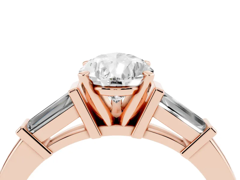 Pear Cut Diamond Solitaire Ring Set in Rose gold with Tapered Baguette Accents and Prong Setting