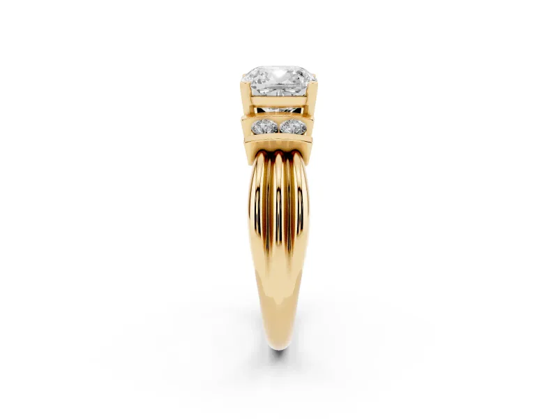 Three-Stone Cushion Cut Diamond Channel Set Ring Set in Yellow gold with Bar Prongs