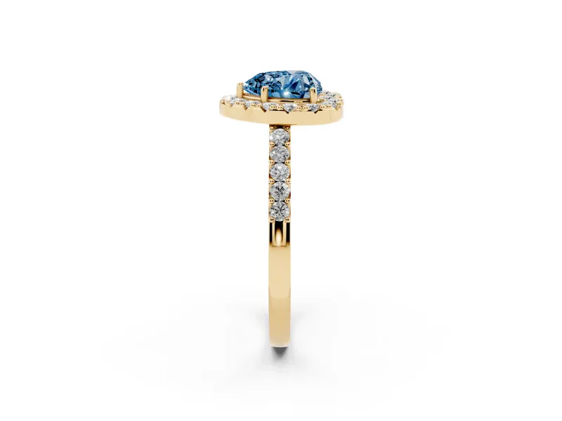 Fancy Blue Heart Cut Diamond Halo Pavé Solitaire Ring Set in Yellow gold with Prong-Set Center Stone