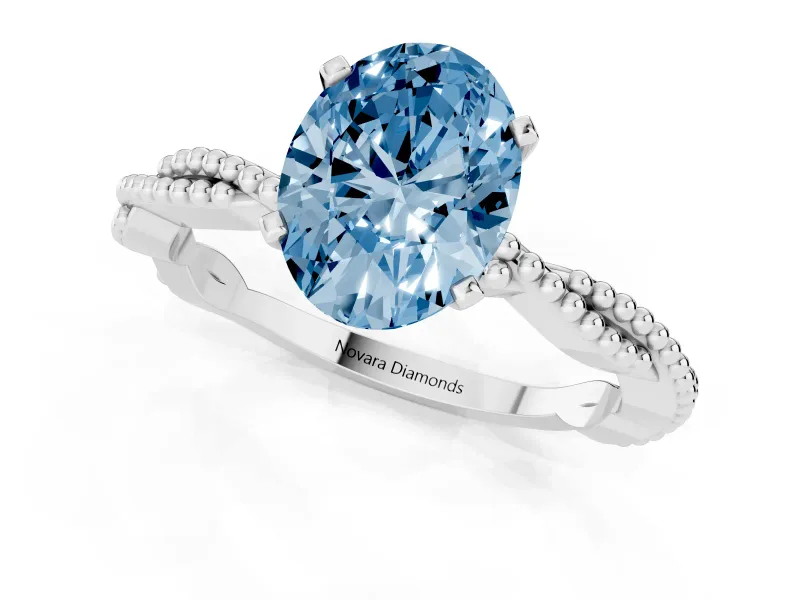 Fancy Blue Oval Cut Diamond Solitaire Ring Set in Silver with Twisted Band and Bead Prong Setting