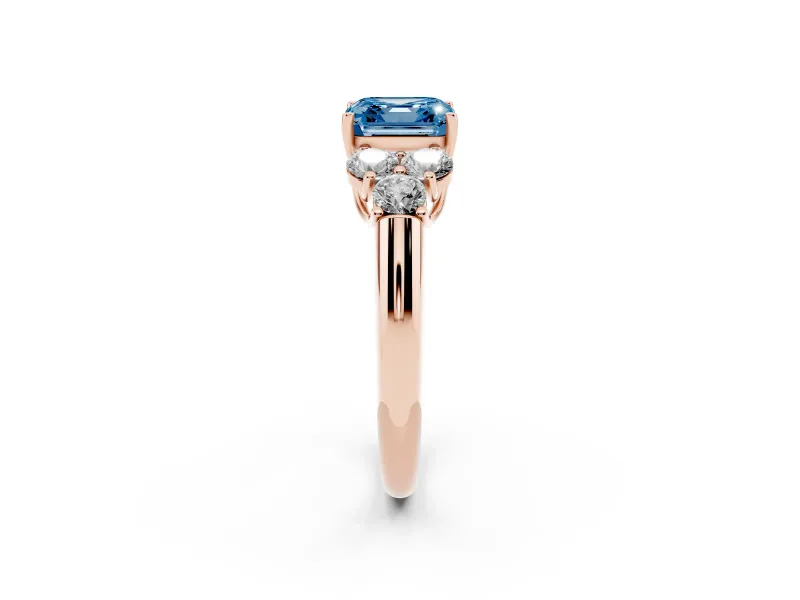 Fancy Blue Asscher Cut Diamond Cluster Ring Set in Rose gold with Round Accent Stones and Prong Setting on a Plain Band