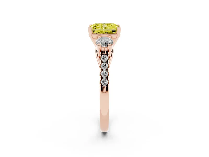 Fancy Yellow Three-Stone Radiant Cut Diamond Pavé Band Ring Set in Rose gold with Prong-Set Trio