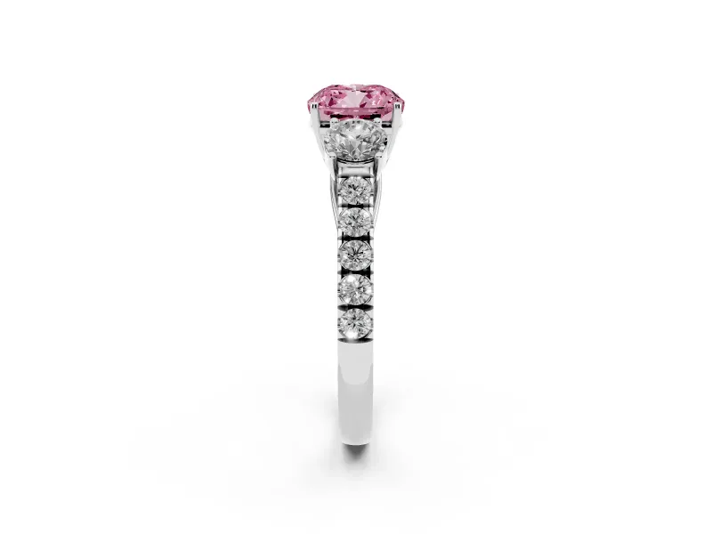 Fancy Pink Cushion Cut Diamond Three-Stone Ring Set in White gold with Round Side Stones and Delicate Pavé Band