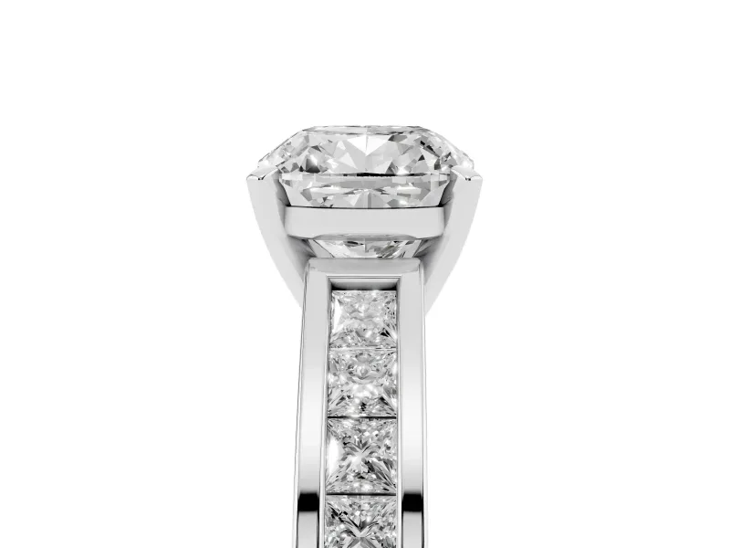 Cushion Cut Diamond Solitaire Ring Set in White gold with Channel-Set Band and Prong Setting