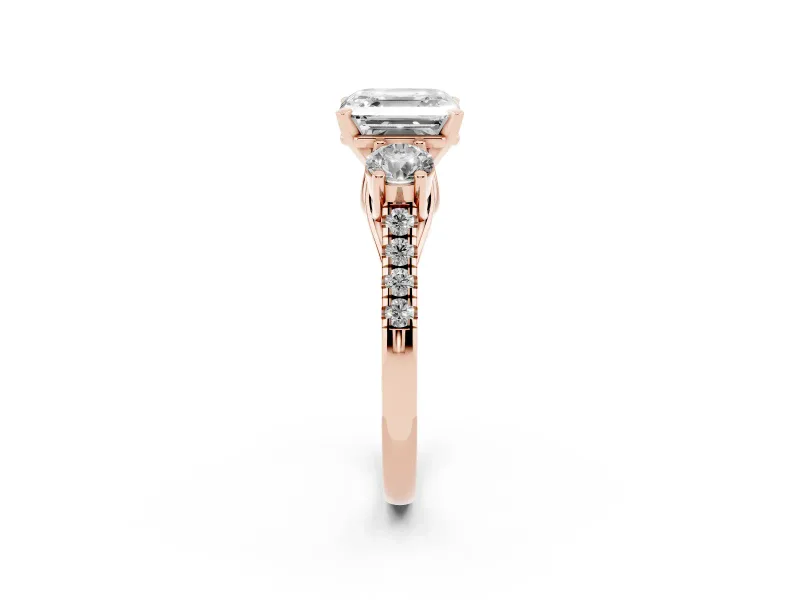 Three-Stone Asscher Cut Diamond Pavé Band Ring Set in Rose gold with Prong-Set Trio