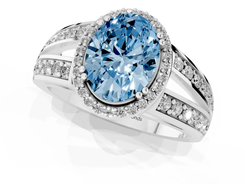 Fancy Blue Oval Cut Diamond Halo Ring Set in Silver with Double Pavé Split Shank