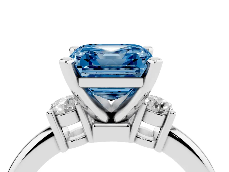 Fancy Blue Three-Stone Asscher Cut Diamond Ring Set in Platinum with Prong Setting and Plain Band