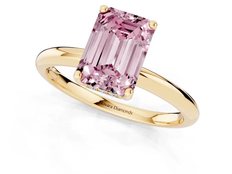 Fancy Pink Emerald Cut Diamond Solitaire Engagement Ring Set in Yellow gold with Prong Setting and Polished Band