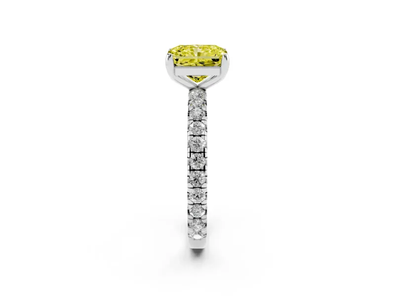 Fancy Yellow Radiant Cut Diamond Pavé Solitaire Ring Set in White gold with Round Band and Prong Setting