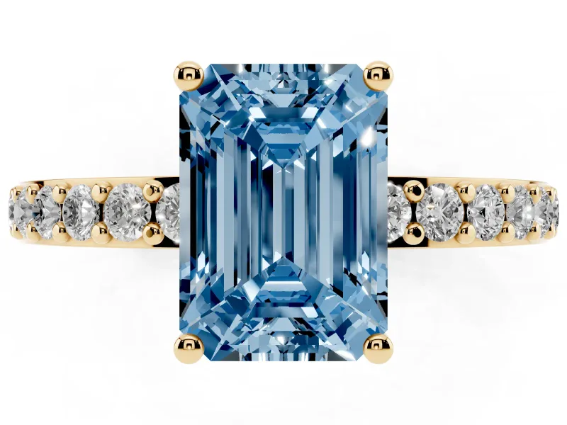 Fancy Blue Emerald Cut Diamond Solitaire Set in Yellow gold with Round Pavé Band and Prong Setting
