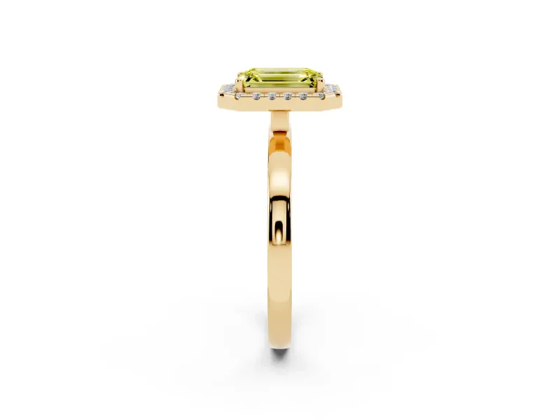 Fancy Yellow Emerald Cut Diamond Halo Solitaire Ring Set in Yellow gold with Pavé Band and Prong Setting