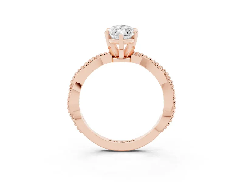Marquise Cut Diamond Solitaire Ring Set in Rose gold with Twisted Band and Bead Prong Setting