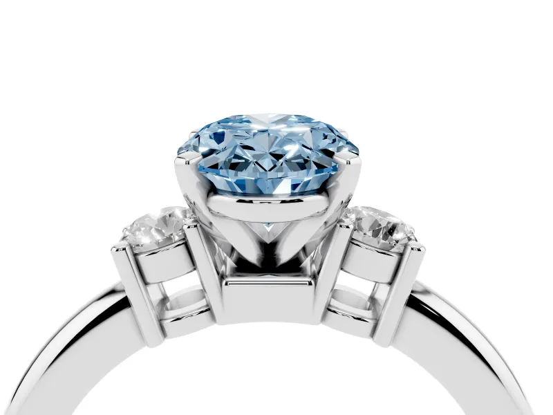 Fancy Blue Three-Stone Oval Cut Diamond Ring Set in Silver with Prong Setting and Plain Band