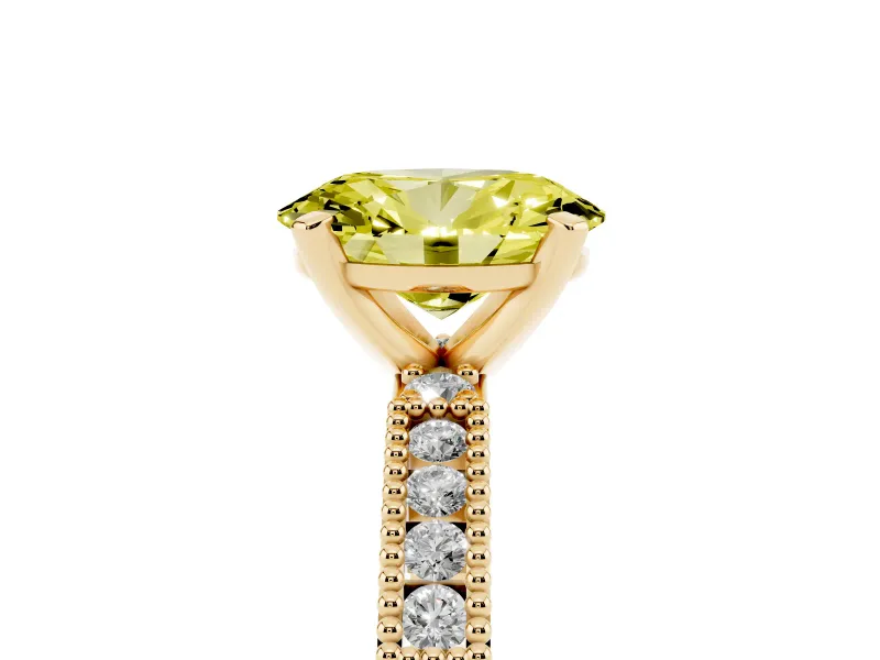 Fancy Yellow Oval Cut Diamond Solitaire Ring Set in Yellow gold with Slim Pavé Band and Prong Setting