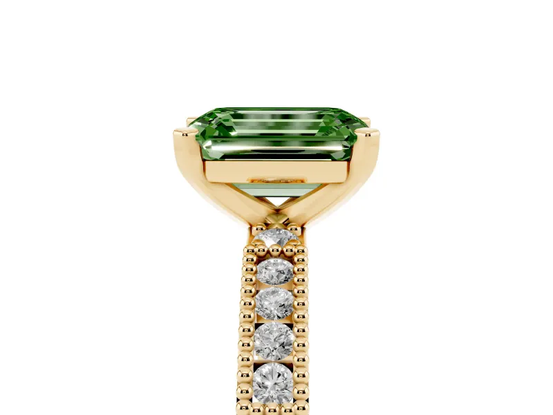 Fancy Green Emerald Cut Diamond Solitaire Ring Set in Yellow gold with Slim Pavé Band and Prong Setting