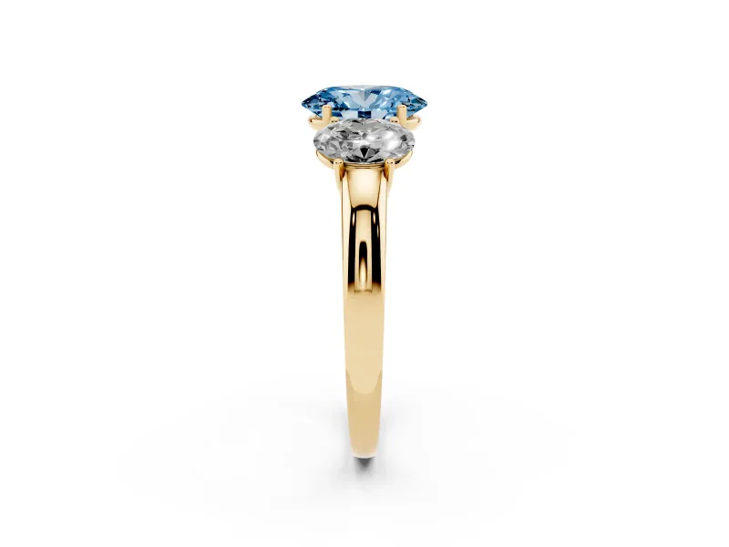 Fancy Blue Oval Cut Diamond Three-Stone Ring Set in Yellow gold with Bold Center and Classic Band